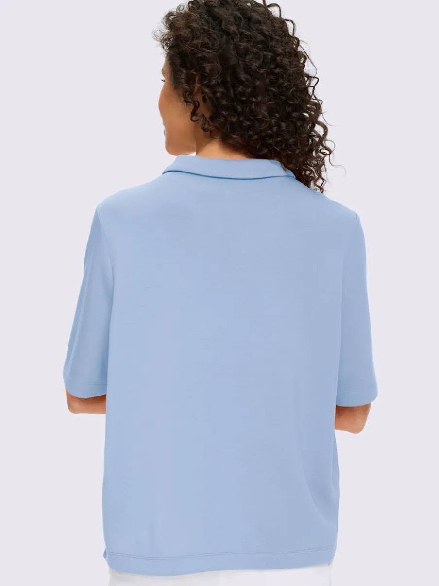 Polo à col zippé en mélange de matières douces et manches courtes