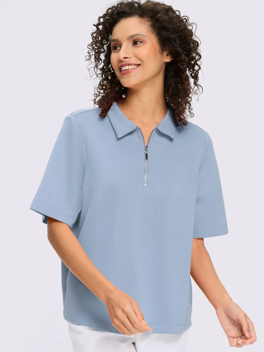 Polo à col zippé en mélange de matières douces et manches courtes