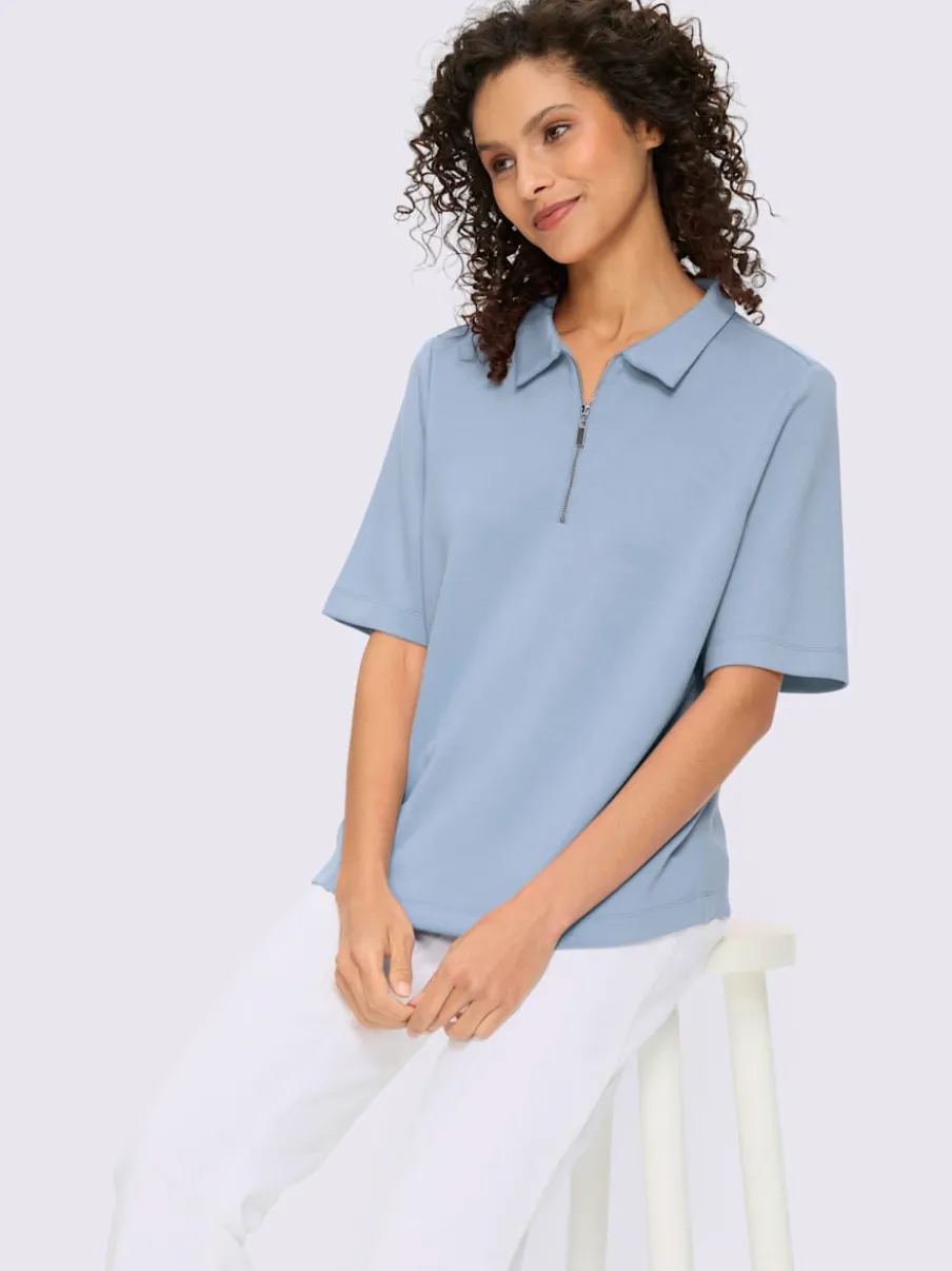 Polo à col zippé en mélange de matières douces et manches courtes