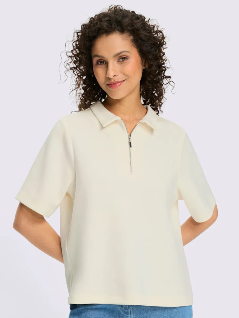 Polo à col zippé en mélange de matières douces et manches courtes