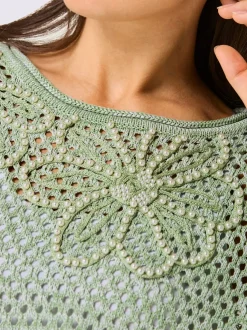 Pull ajouré avec col rond et manches longues brodé