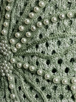 Pull ajouré avec col rond et manches longues brodé