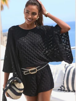 Pull ajouré en tricot à encolure ronde avec manches 3/4 bataillon