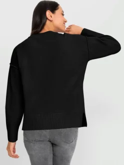 Pull ample encolure ronde avec mancherons et fentes latérales
