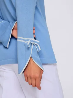 Pull au col rond avec finitions élégantes et doux nœuds