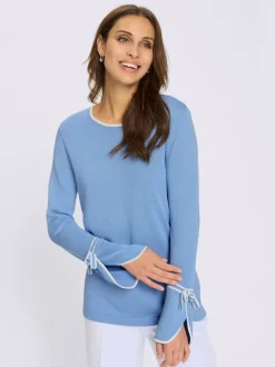 Pull au col rond avec finitions élégantes et doux nœuds
