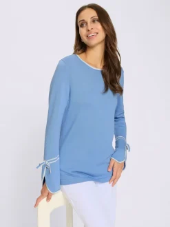 Pull au col rond avec finitions élégantes et doux nœuds