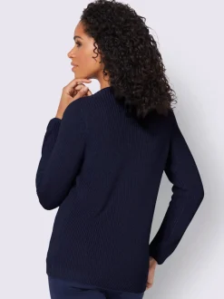 Pull avec boutonnières avant à effet affinant et côtelé