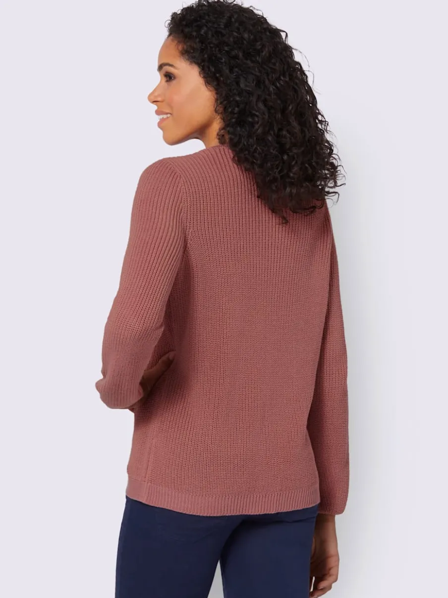 Pull avec boutonnières avant à effet affinant et côtelé