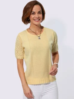 Pull bouclé avec motif ajouré et manches côtelées