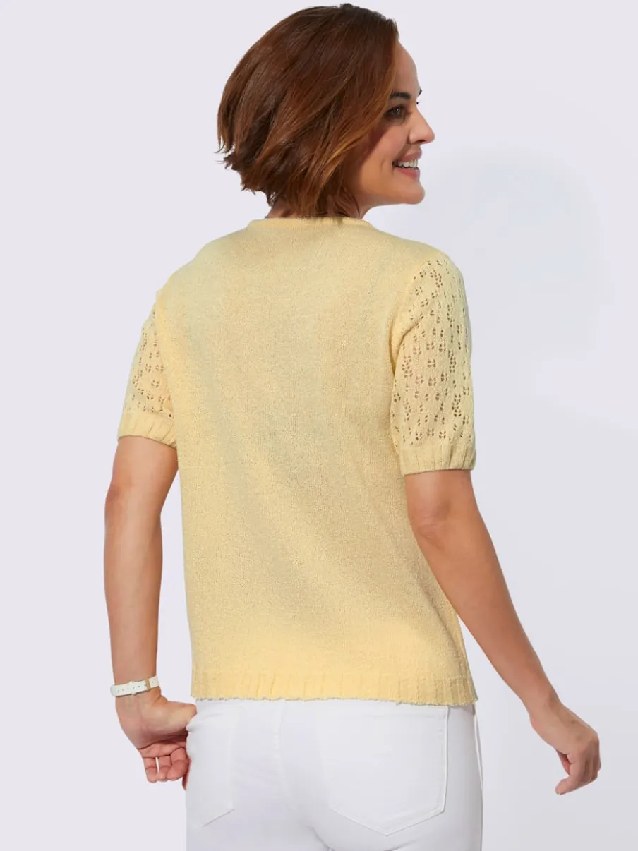 Pull bouclé avec motif ajouré et manches côtelées