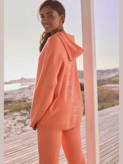 Pull à capuche en tricot avec logo brodé doux