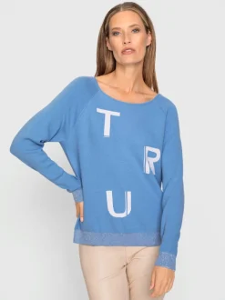 Pull à col large avec manches longues et motifs jacquard brillants