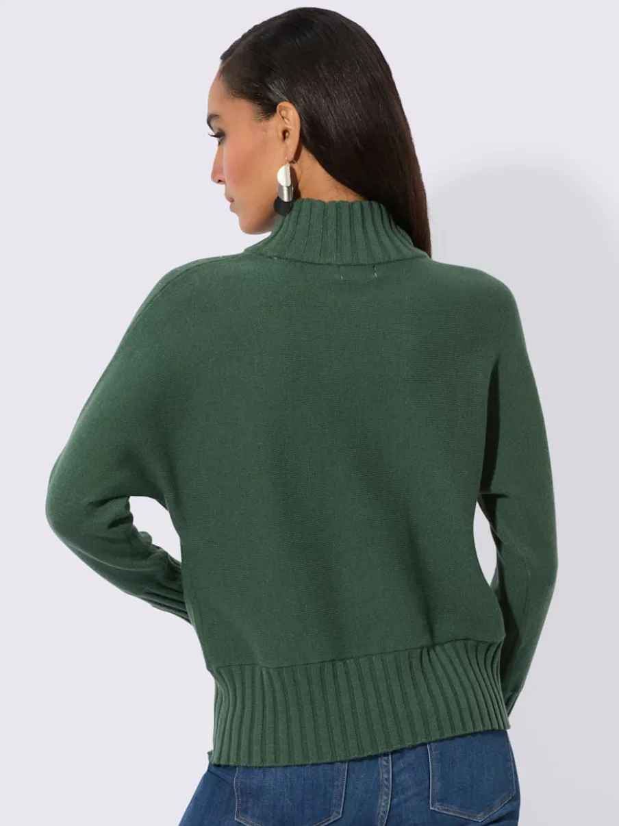 Pull à col montant avec manches chauve-souris et ornements
