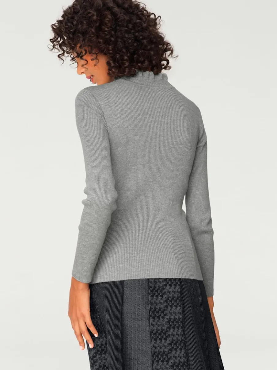 Pull à col montant avec manches longues et coupe ajustée
