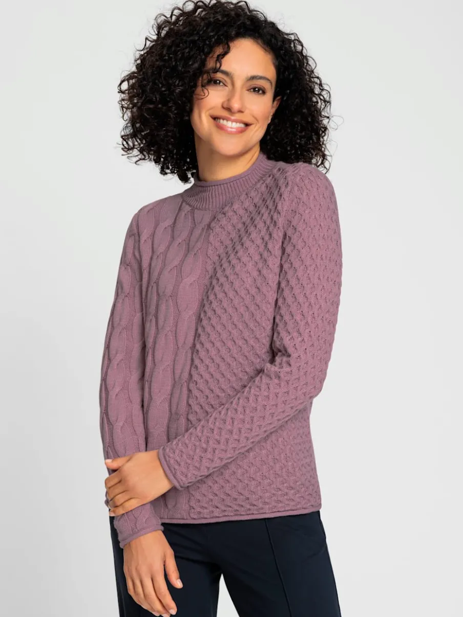 Pull à col montant à motifs géométriques et torsadés
