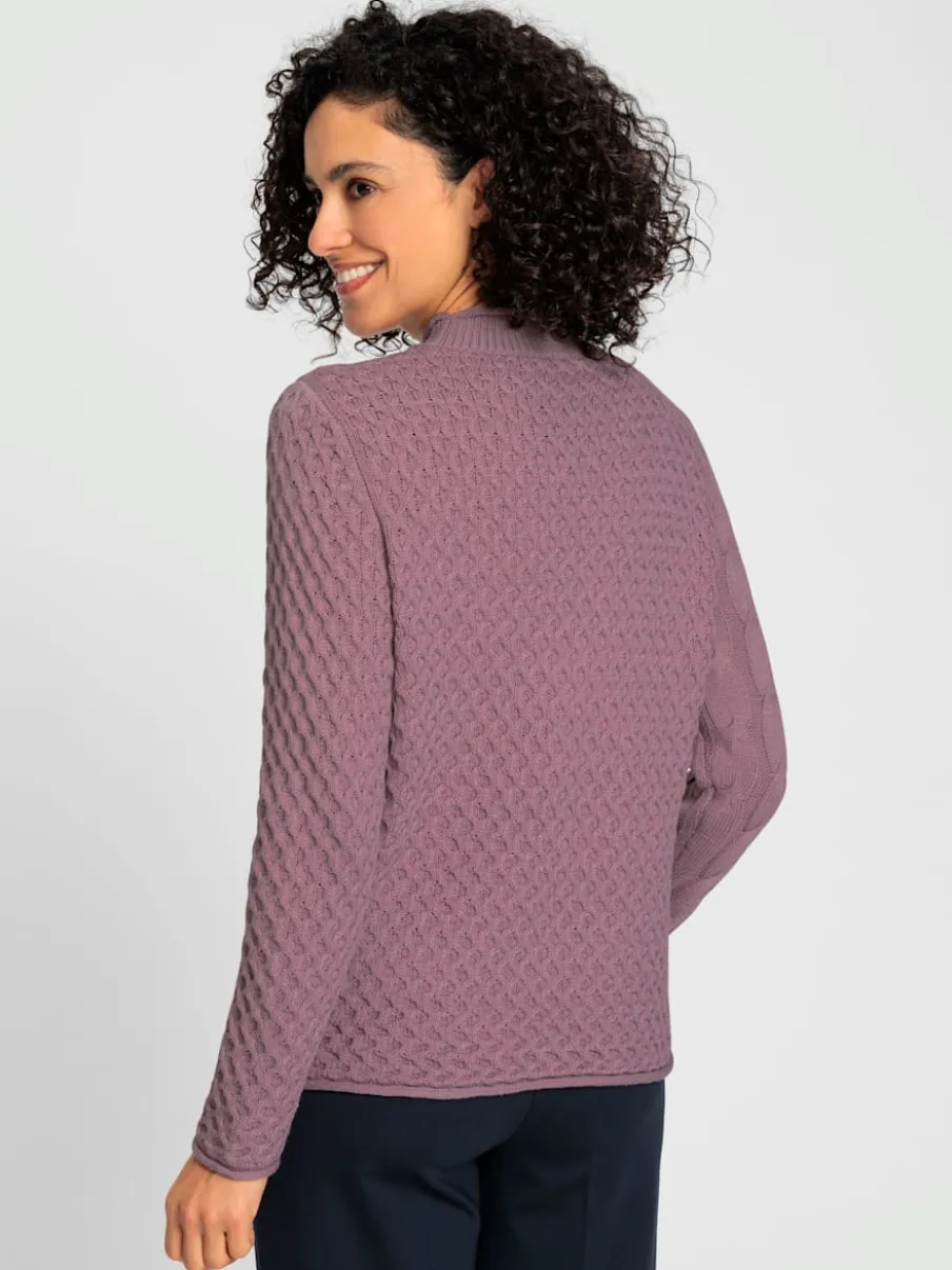 Pull à col montant à motifs géométriques et torsadés