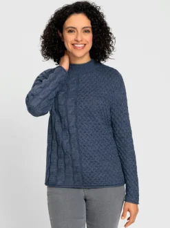 Pull à col montant à motifs géométriques et torsadés