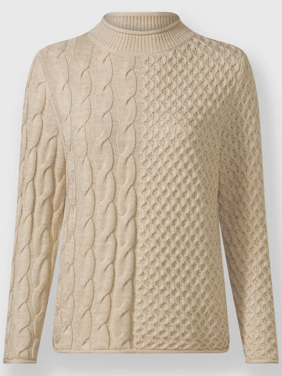 Pull à col montant à motifs géométriques et torsadés