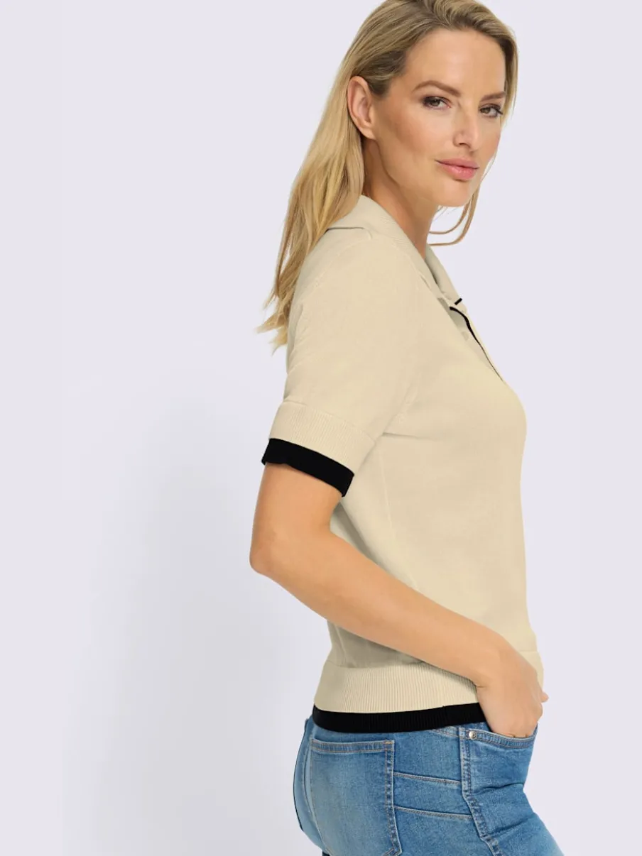 Pull à col polo avec empiècements contrastés et manches courtes