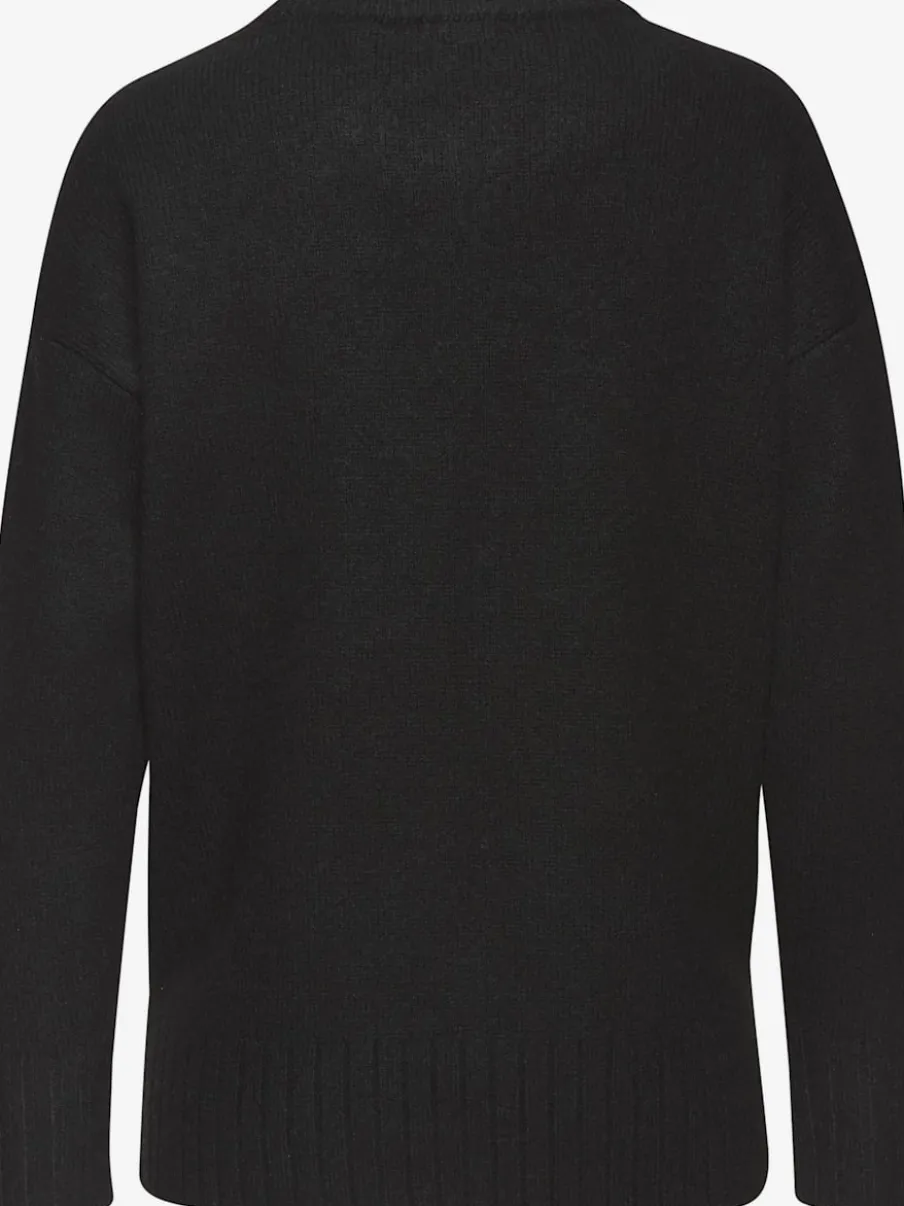 Pull col rond avec manches longues et coutures décoratives