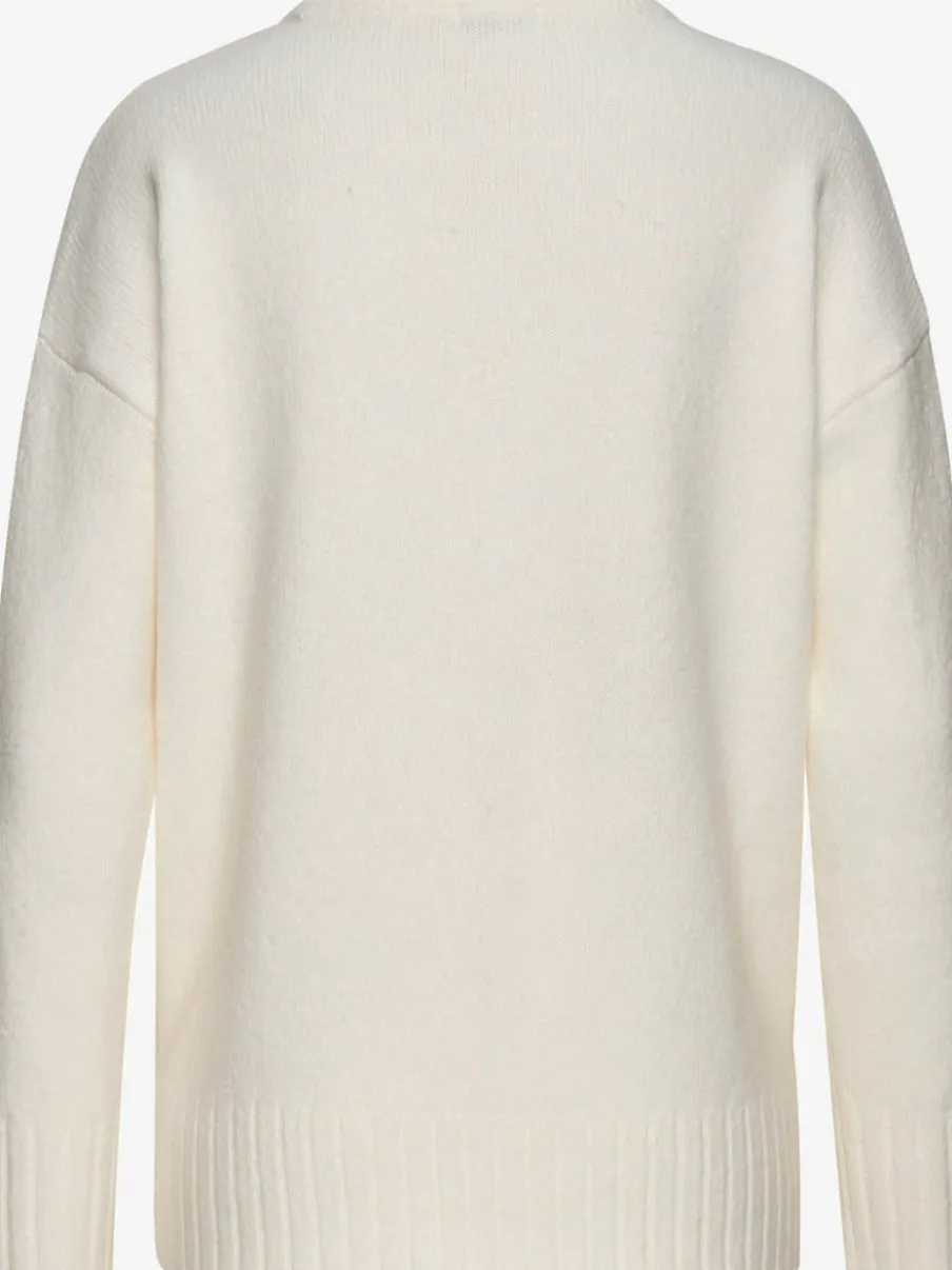 Pull col rond avec manches longues et coutures décoratives