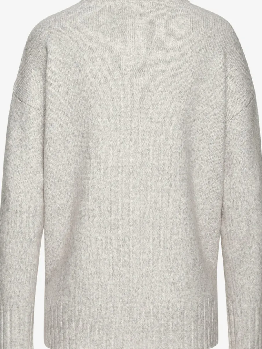 Pull col rond avec manches longues et coutures décoratives