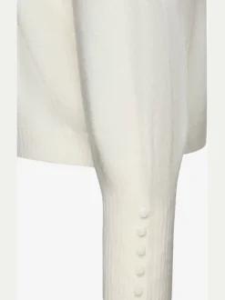Pull col rond avec manches longues et boutons doux
