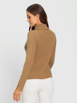 Pull col roulé avec découpes et perles fantaisie