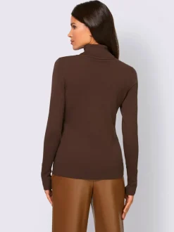 Pull à col roulé avec manches longues et boutons décoratifs