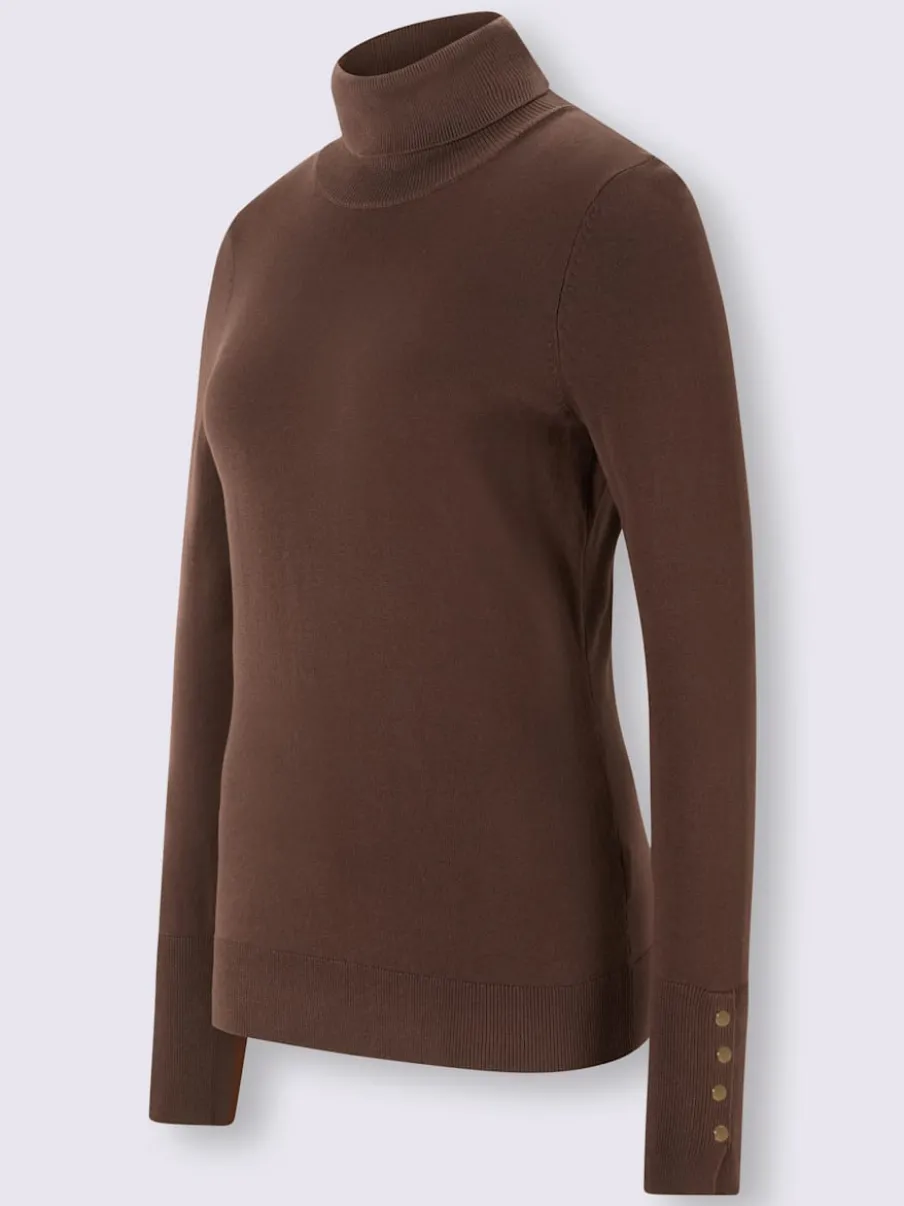 Pull à col roulé avec manches longues et boutons décoratifs