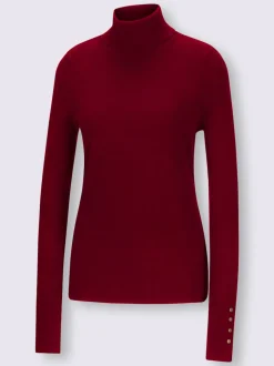 Pull à col roulé avec manches longues et boutons décoratifs