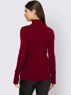 Pull à col roulé avec manches longues et boutons décoratifs