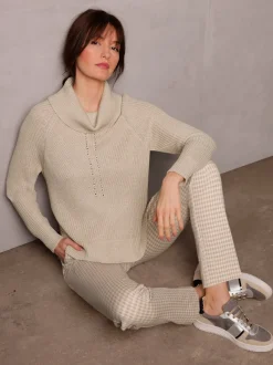 Pull à col roulé avec manches raglan et motif côtelé