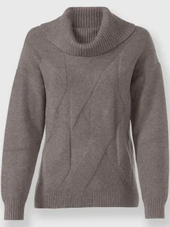 Pull à col roulé avec motif torsadé et manches longues