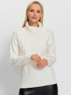 Pull à col roulé avec motif torsadé et manches longues
