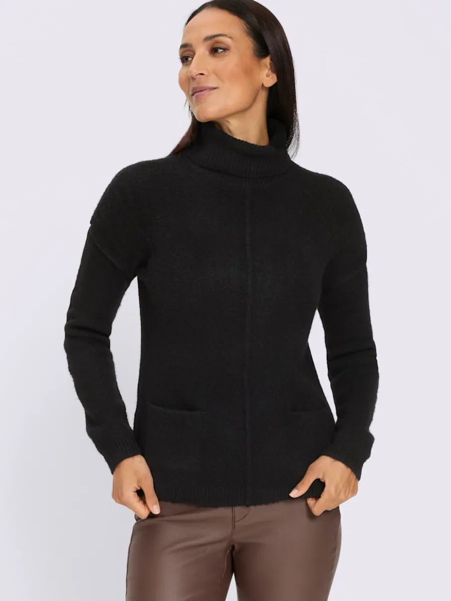 Pull à col roulé couture centrale devant