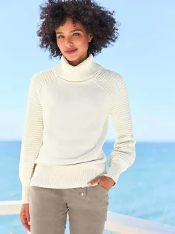 Pull à col roulé en pur coton avec manches ballon et bords-côtes