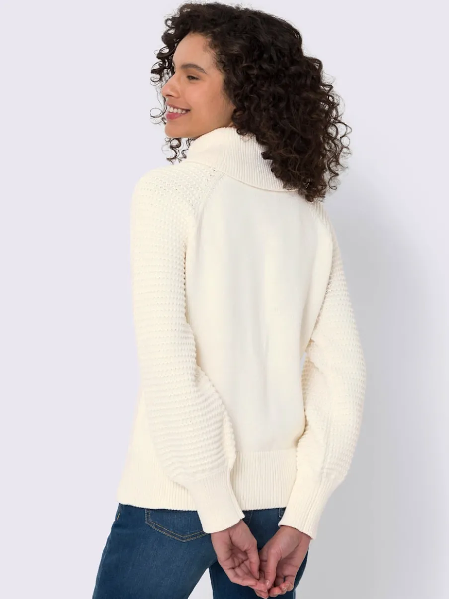 Pull à col roulé en pur coton avec manches ballon et bords-côtes