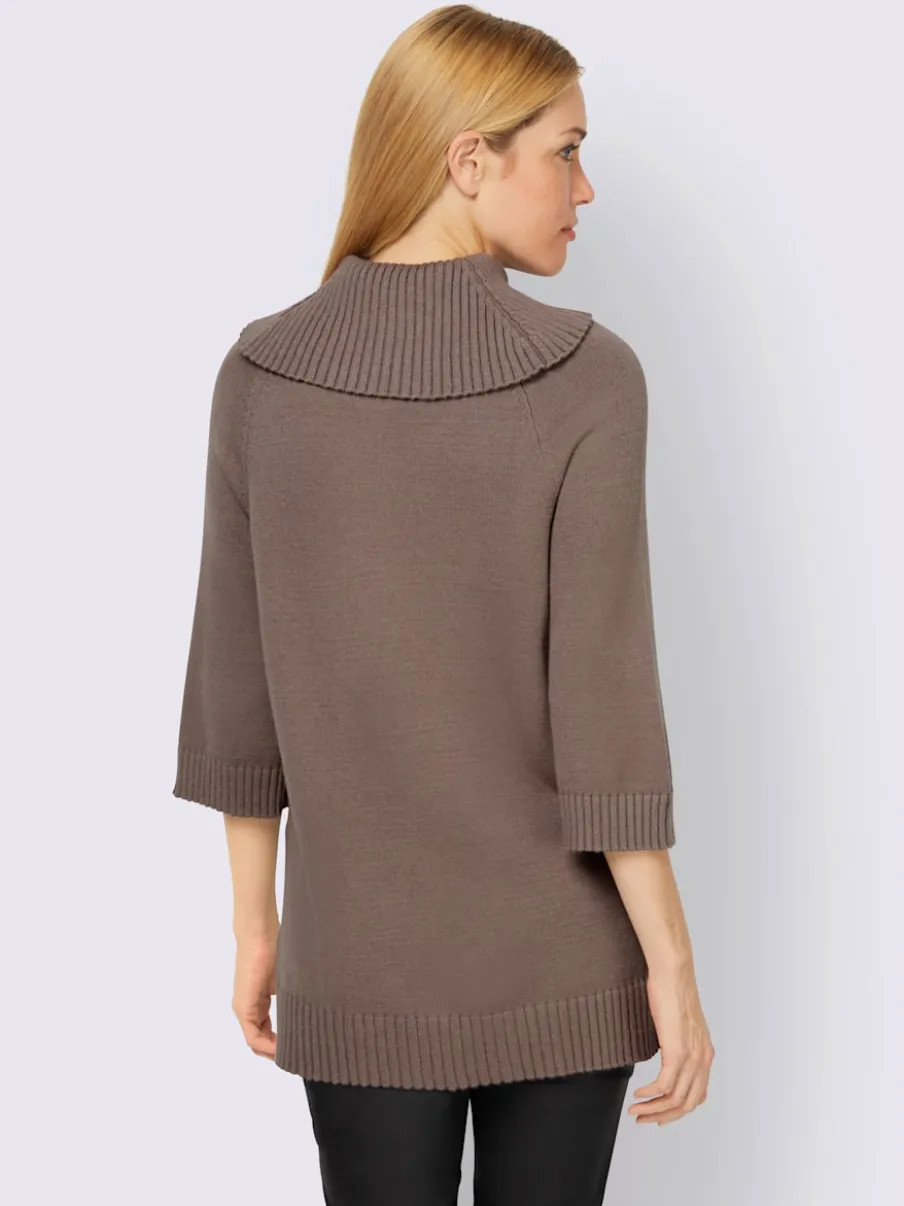 Pull col roulé à manches 3/4 avec fente latérale