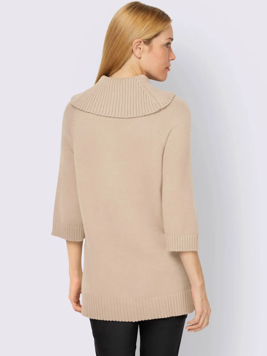Pull col roulé à manches 3/4 avec fente latérale