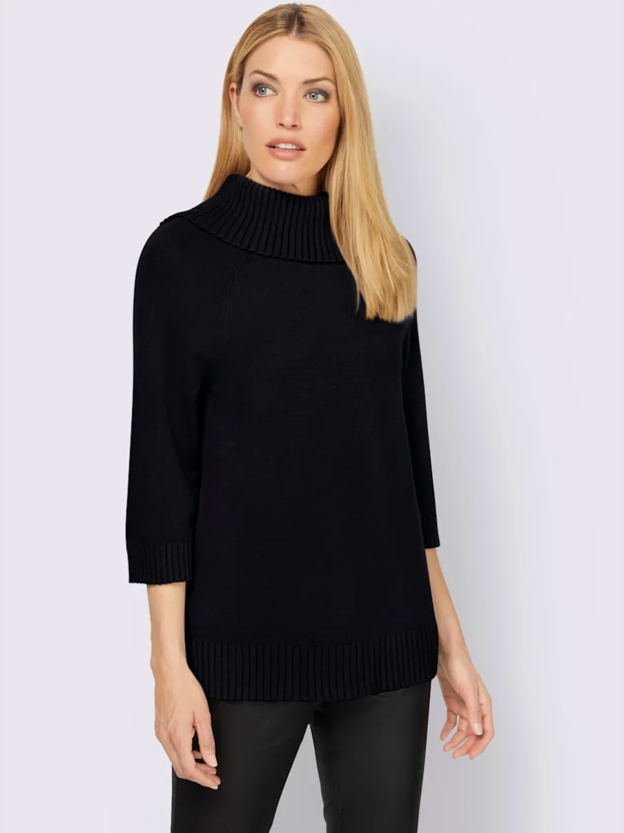 Pull col roulé à manches 3/4 avec fente latérale