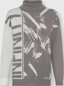 Pull col roulé à motif jacquard et manches longues