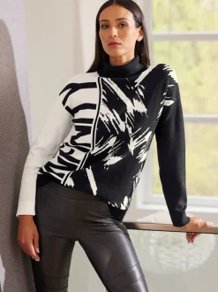Pull col roulé à motif jacquard et manches longues