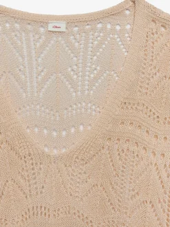 Pull de plage encolure en V avec manches longues et motif ajouré transparent