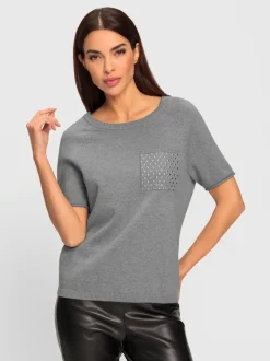 Pull doux avec poche poitrine et manches courtes roulottées