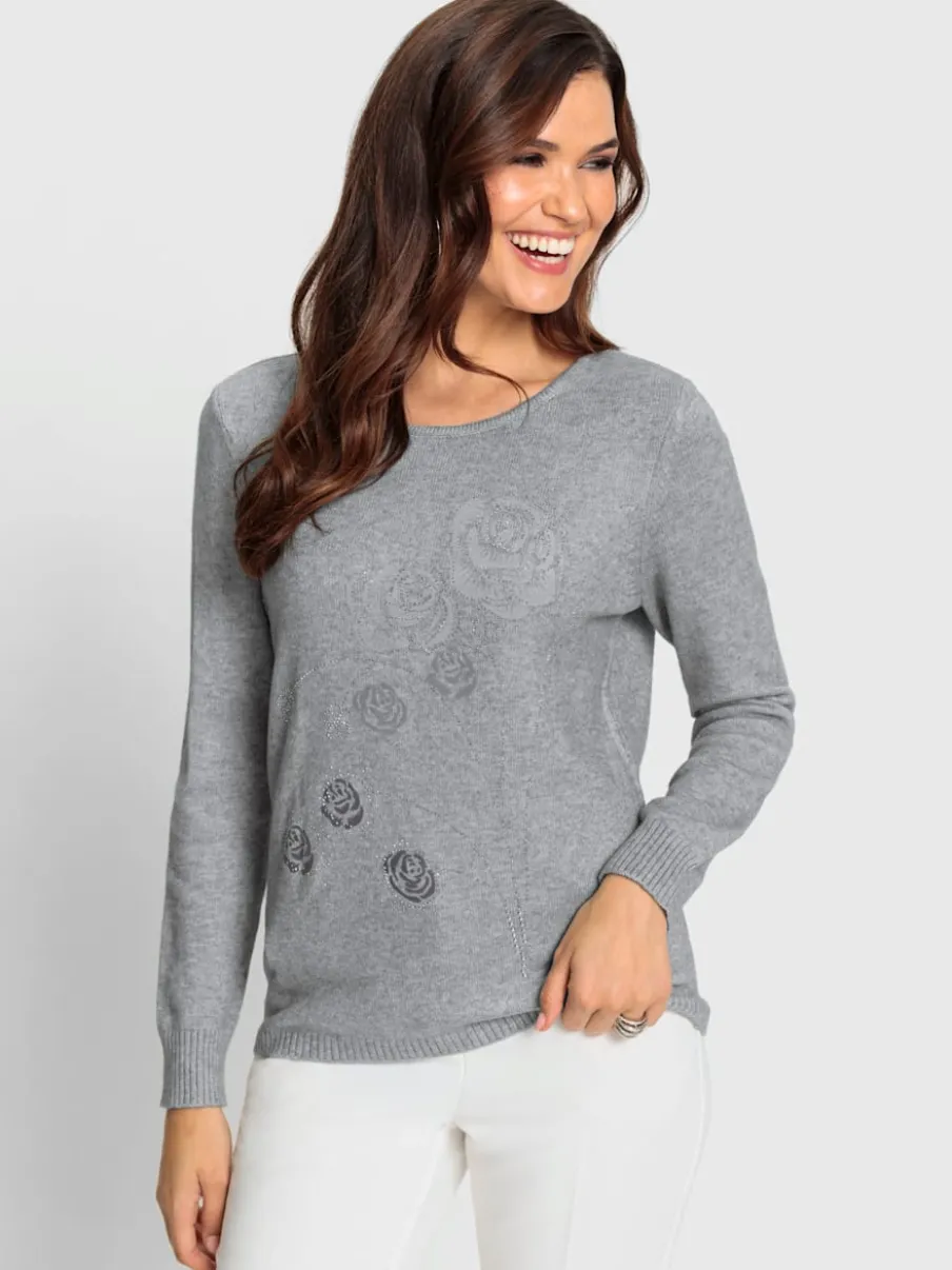 Pull encolure ronde motifs floraux et pierres brillantes