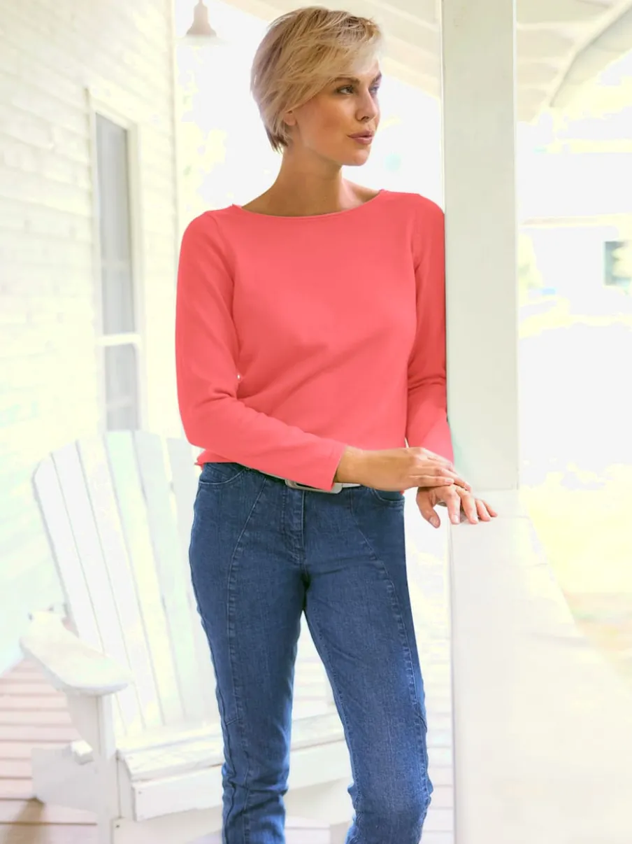 Pull en coton à encolure U manches longues bords roulés