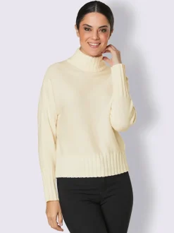 Pull en laine mérinos avec col montant et manches chauve-souris
