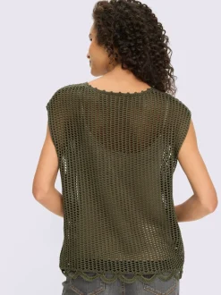Pull en tricot ajouré avec encolure ronde et bord ondulé